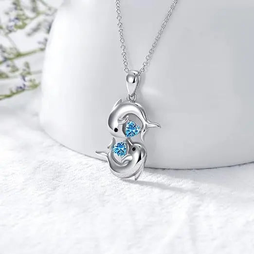 Necklace in Silver with Double Dolphins & Crystal Blue