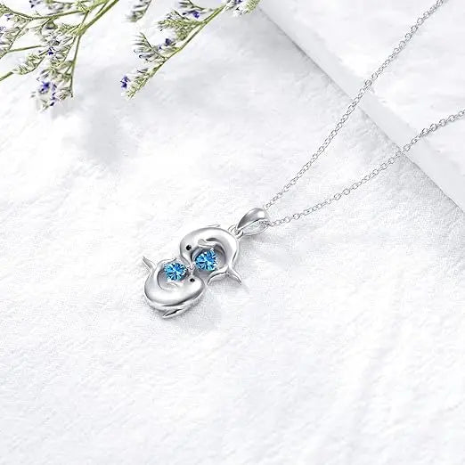 Necklace in Silver with Double Dolphins & Crystal Blue